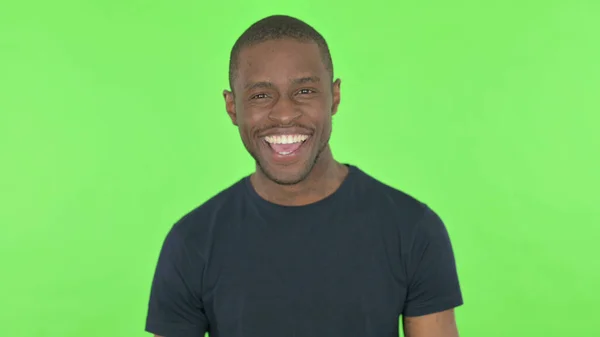 African Man Shaking Head Yes Sign Green Background — Stock Photo, Image