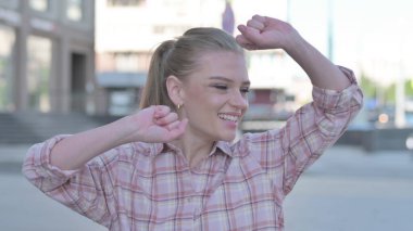 Happy Casual Woman Dancing Outdoor, Feeling Excited