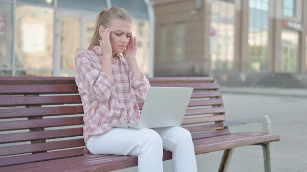 Casual Woman Headache Using Laptop While Sitting Outdoor Bench — Foto Stock