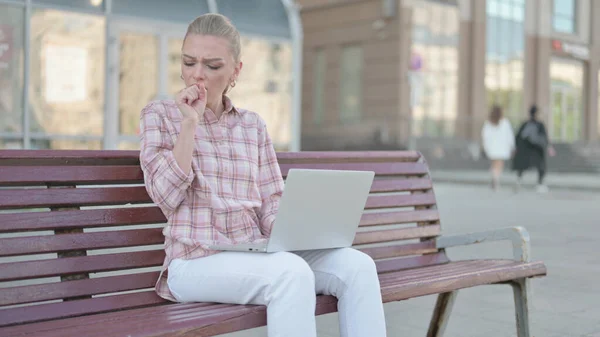 Coughing Casual Woman Using Laptop While Sitting Outdoor Bench — Foto Stock