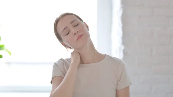 Young Woman Pain Massaging Her Neck — Stok fotoğraf