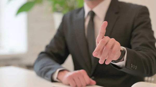 Close up of Hand Gesture of Mature Adult Man Saying No by Finger, Denial