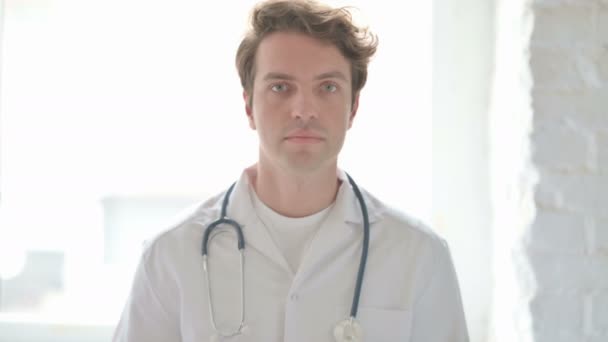 Serious Male Doctor Looking Camera — Stock Video