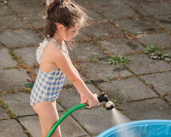 Cute Gril Bathing Suit Playing Water Hose Warm Afternoon — Stock Photo, Image