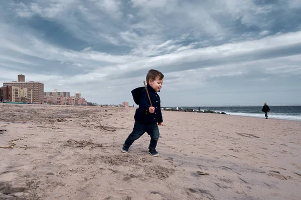 Happy Young Toddler Running Beach Big Branch — Stock Photo, Image