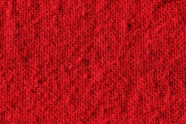 Tasarım işi için kırmızı ve kabarık örülmüş arka plan desenli yüzey