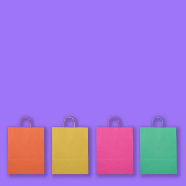 Kleurrijke Papieren Zakken Geïsoleerd Lila Achtergrond — Stockfoto