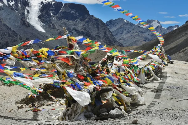 Tibetan prayer flags on a mountain pass in Ladakh, Himalayas, North India