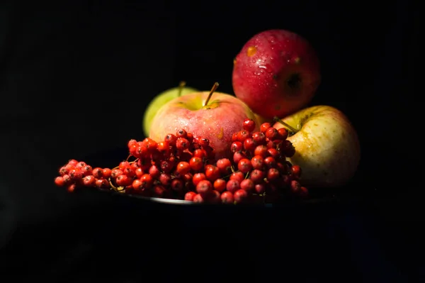 red apples on a black background