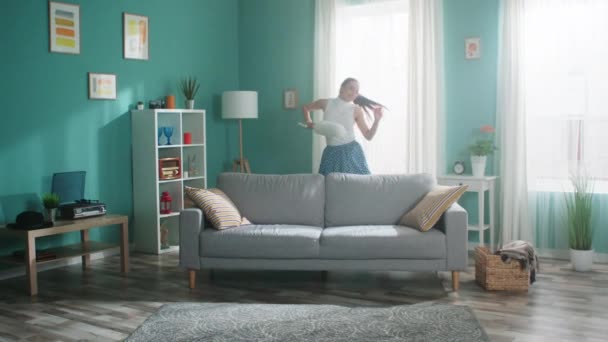 Energetic Woman Is Dancing with Cleaning Brush — Stock Video