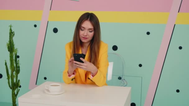 Pretty Woman Uses Mobile Phone — Stock Video