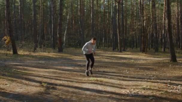 Man Practices High Knee Running — Stock video