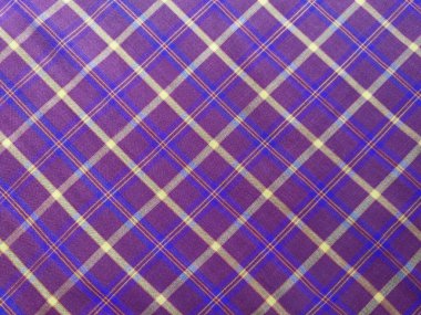 Ekose desenli, yüksek açılı kestane rengi elbisenin soyut arkaplanı.