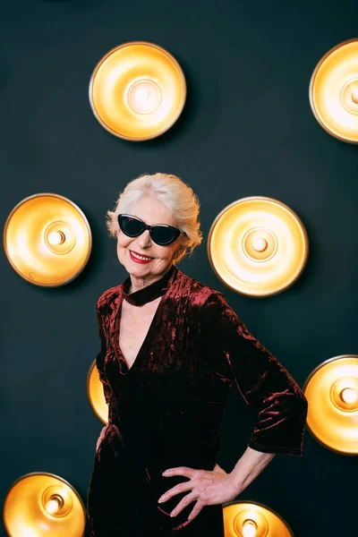 Senior Stylish Elegant Woman Sunglasses Glass Lamps Dark Background Party — Stock Photo, Image