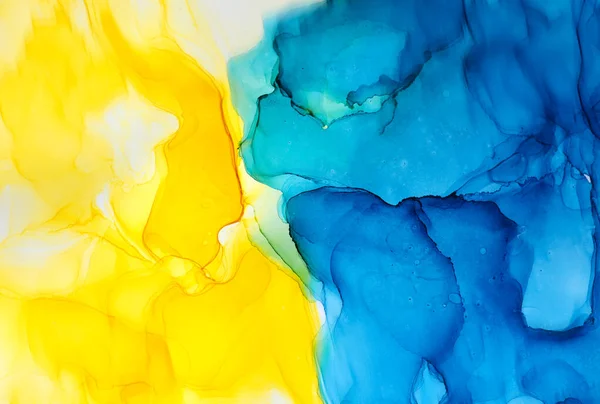 Abstract blue and yellow fragment of colorful background, wallpaper. Mixing acrylic paints. Modern art. Marble texture. Alcohol ink colors translucent. Alcohol Abstract contemporary art fluid.