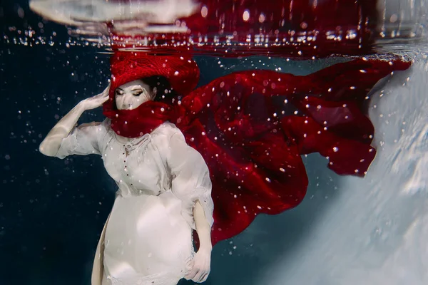 Woman Red Hat Red Scarf Underwater — Stok fotoğraf