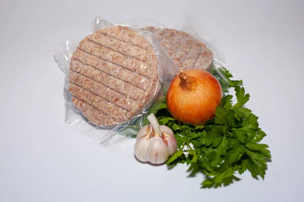 Minced turkey meat in a package. Fresh meat with herbs and spices. Organic delicious titanium meat