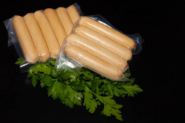 Turkey sausages in food packaging. Meat products of poultry