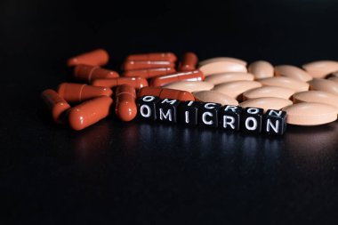 Omicron antiviral hapları. Antiviral ilaçlar. Harflerden yazılan omikron