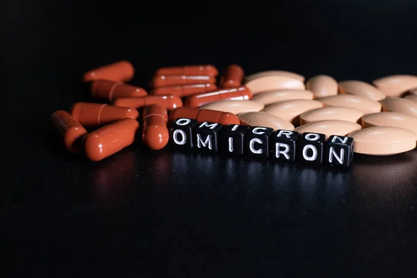 Omicron antiviral hapları. Antiviral ilaçlar. Harflerden yazılan omikron