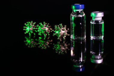 Antikorlu cam kavanozlar. Yüzü olan güçlü, öfkeli bir virüs. Koronavirüs biraz bulanık..