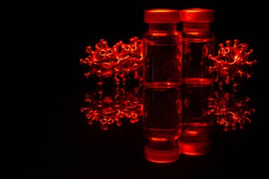 Antikorlu cam kavanozlar. Yüzü olan güçlü, öfkeli bir virüs. Koronavirüs biraz bulanık..