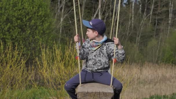 Child Big Swing Boy Sitting Wooden Swing — Vídeo de stock
