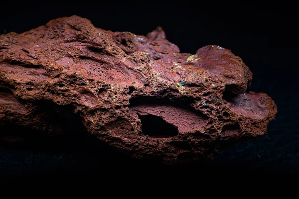 Red Rough Real Lava Stone Macro Focused Isolated Black Surface — Stock Photo, Image
