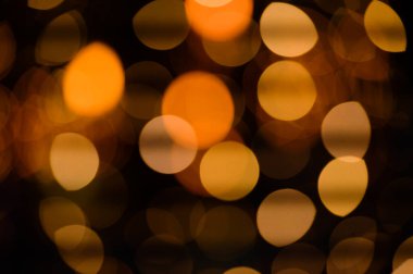 soyut kavram sarı halkalar gece siyah arka planda bokeh