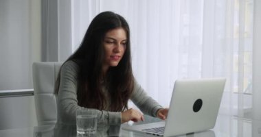 brunette woman have casual conversation in video chat.