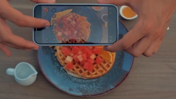 Take a picture of your food with your smartphone to post to your account. Top view — Stock Video