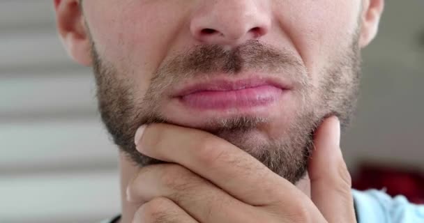 Pensive Confused Guy Leaning Hand Rubbing Beard While Thinking Difficult — Stockvideo