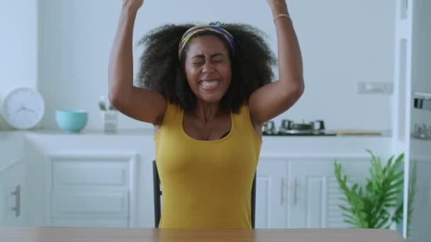 Happy African Woman Smiling Cheerfully Rejoicing Clenching Fists Raising Arms — Vídeo de Stock