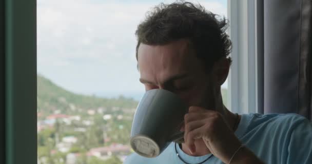 Portrait Young Caucasian Man Enjoying His Morning Coffee While Gazing — Wideo stockowe