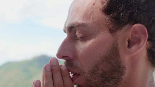 Headshot Peaceful Caucasian Man Quietly Saying Prayer While Praying God — Vídeo de stock
