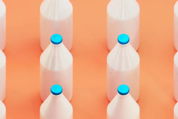 图案由透明玻璃瓶牛奶橙色背景 世界牛奶日第3天 — 图库照片
