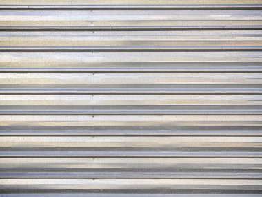 Metal kıvrımlı çit galvanize renk dokusu arkaplanı.