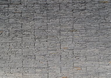 Gri yığın taş duvar dokusu ve arkaplanı