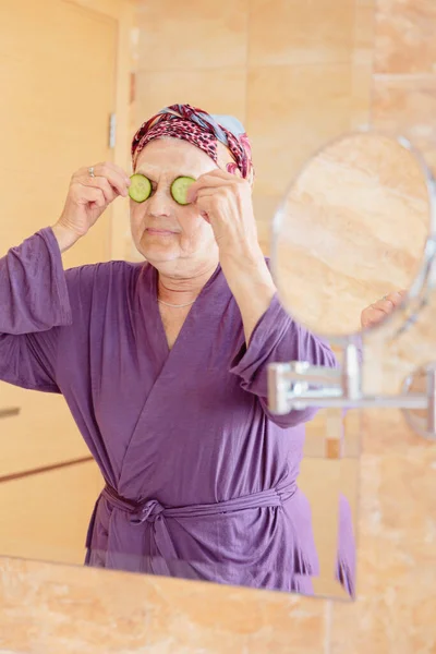 Mature Woman Taking Care Her Face Senior Woman Standing Mirror — Fotografia de Stock