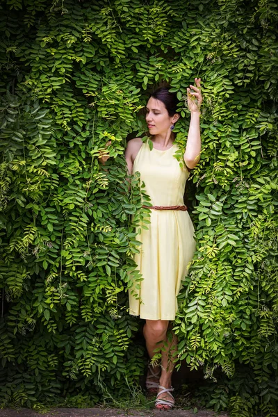 Woman Staying Surrounded Lush Green Plants Touching Leaves Caucasian Woman Royalty Free Stock Photos
