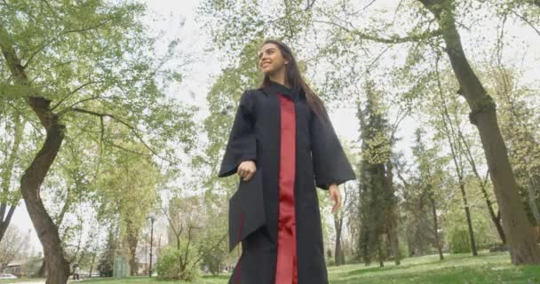 Front View Pretty Brunette Female Long Hair Wearing Graduation Gown — ストック動画