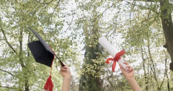 Close Young Graduate Bachelor Master Holding Mortarboard Diploma Hands Raising — Vídeo de Stock