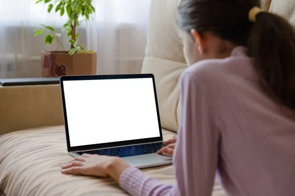 Girl Laptop Lies Couch Laptop Blank White Display Selective Focusing — Stock Photo, Image