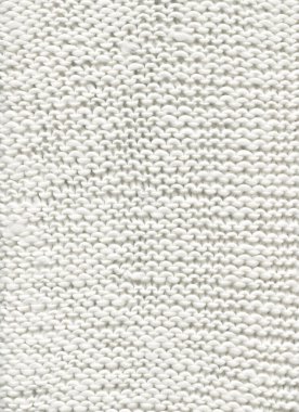 Reklamlar için boş yeri olan beyaz örülmüş boho kumaş dokusu. Örgü, temiz kış kumaşı dokusu.