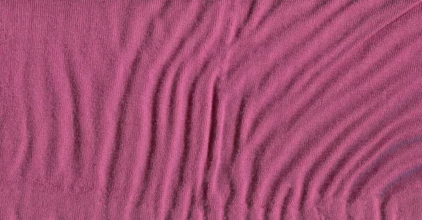 ニットピンクのセーターの壁紙のテクスチャ ウィッカーパターンを持つ繊維ピンク素材 — ストック写真
