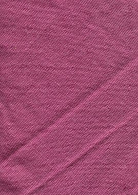 Angora sıcacık pembe örülmüş kumaş dokusu. Mor pembe süveter desenli örgü. Yaklaş..