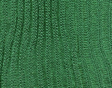 Doğal tekstil yeşil süveter dokusu. Örülmüş eko yeşil kazak duvar kağıdı dokusu.