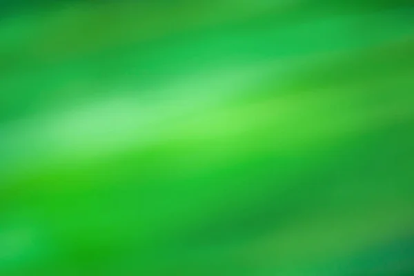 Abstract gradient green blurred colorful background. Vibrant green gradient colors blur surrealism background