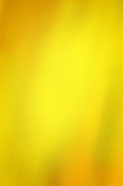 Sarı renkli soyut bokeh arkaplan. Bokeh, sarı soyut arkaplanda bulanık ışıklar yanıp sönüyor.