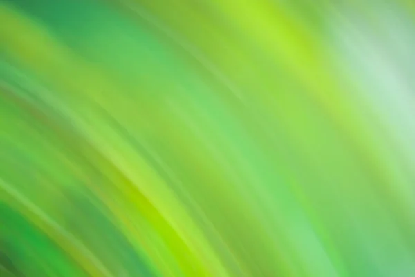 長時間露光の動き緑のぼかし 高速モーションブラーグリーンの背景 — ストック写真